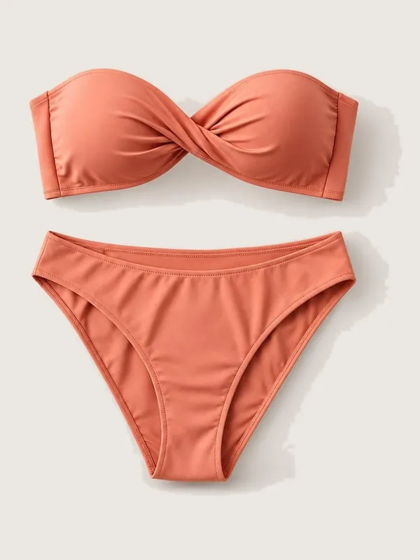 AI-generated product photo of the coral bandeau bikini, one of the pieces in the Someone Shop.
