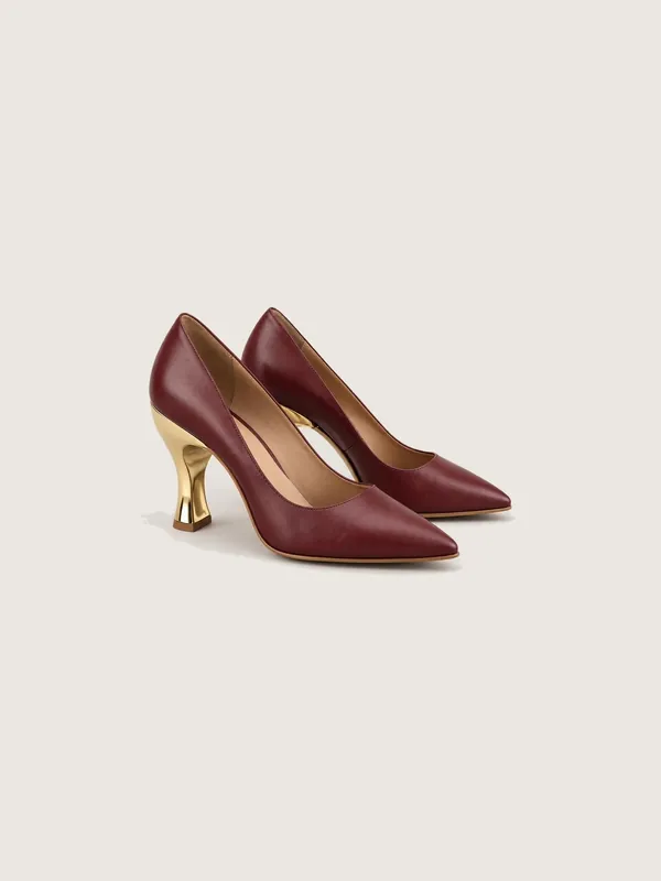 AI-generated product photo of the burgundy sculpture, one of the pieces in the Someone Shop.